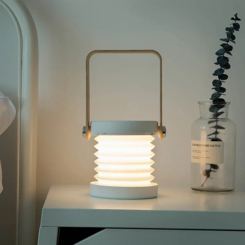 Składana skandynawska minimalistyczna przenośna lampa stołowa z drewnianym uchwytem, ładowana