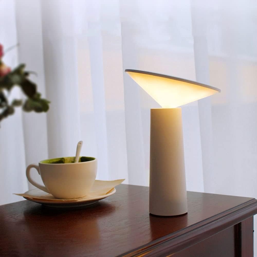 Rzeźbiarska bezprzewodowa lampa stołowa z akumulatorem i funkcją ściemniania, o stożkowej sylwetce