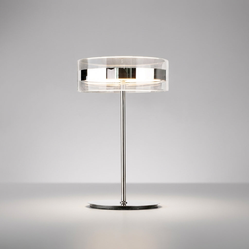 Elegancka cylindryczna lampa stołowa z przezroczystym kloszem i smukłym prętem