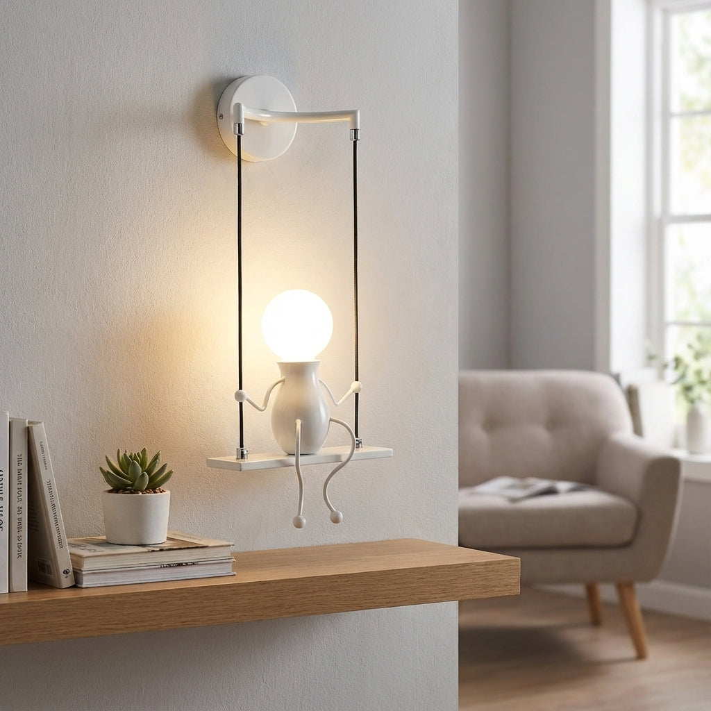 Trwała metalowa lampa ścienna z sylwetką kołyszącej się postaci