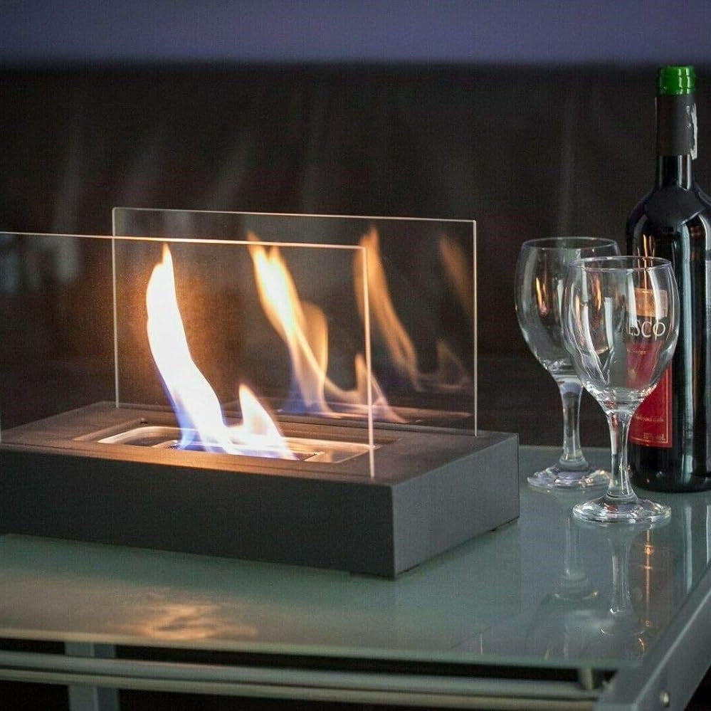 Prostokątna szklana przenośna lampa stołowa z metalową podstawą w formie kominka