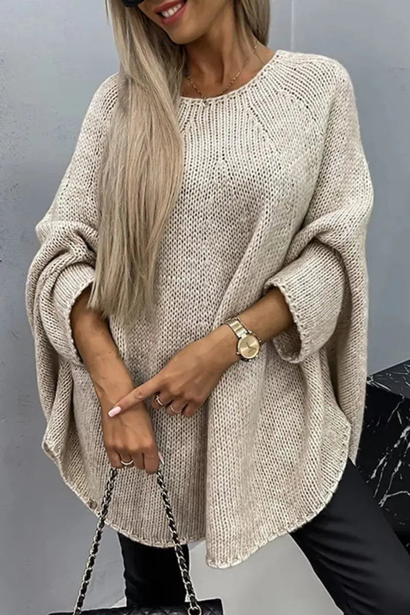 Damski oversize’owy sweter z dzianiny z okrągłym dekoltem i rękawami nietoperzami