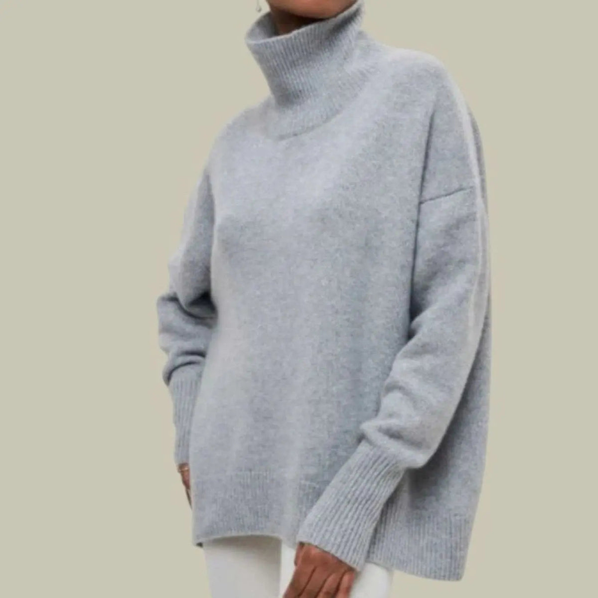 Damski oversize’owy luźny dzianinowy sweter zimowy z golfem